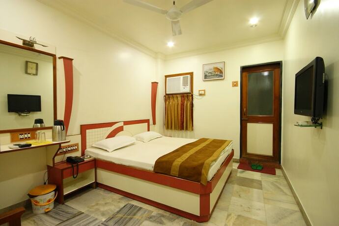 Imagen de la habitación del Hotel Good Night, Ahmedabad. Foto 15