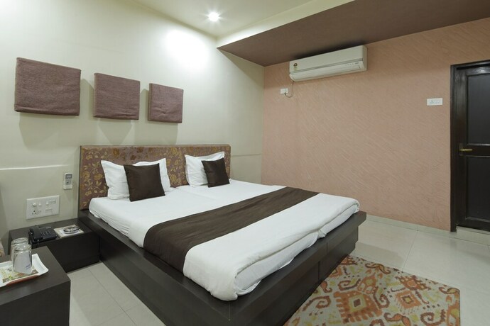 Imagen de la habitación del Hotel Good Night, Ahmedabad. Foto 20