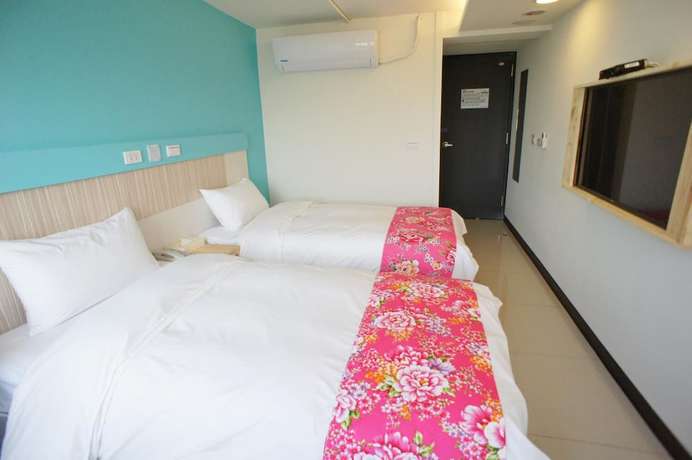 Imagen de la habitación del Hotel Good Night, TAOYUAN. Foto 8