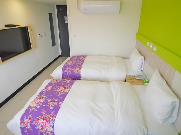 Imagen de la habitación del Hotel Good Night, TAOYUAN. Foto 11