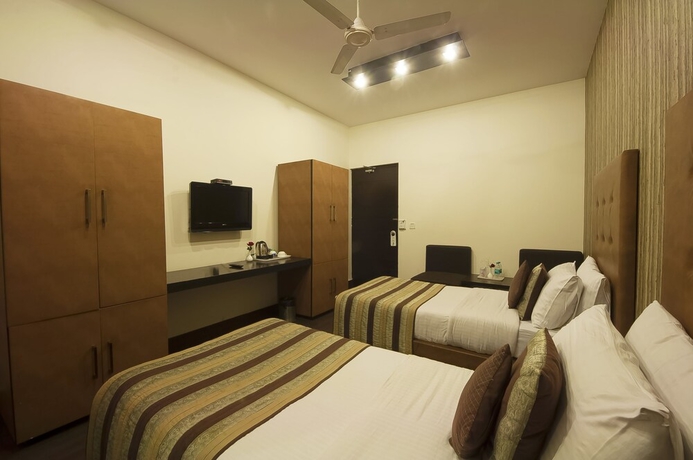 Imagen de la habitación del Hotel Good Palace. Foto 16