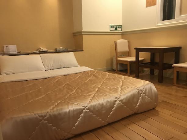 Imagen de la habitación del Hotel Good, Taichung. Foto 15