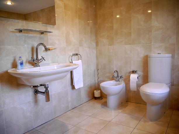 Imagen de la habitación del Hotel Goodenough Guesthouse. Foto 12