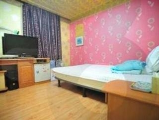 Imagen de la habitación del Hotel Goodstay Dongrae Oncheon. Foto 11