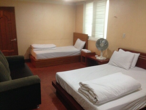 Imagen de la habitación del Hotel Goodstay Herotel. Foto 16