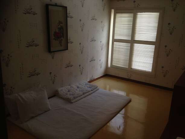 Imagen de la habitación del Hotel Goodstay Herotel. Foto 19