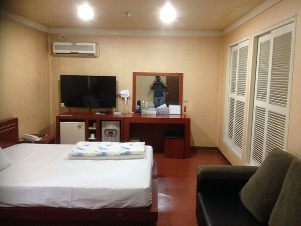 Imagen de la habitación del Hotel Goodstay Herotel. Foto 21