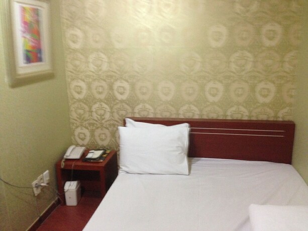 Imagen de la habitación del Hotel Goodstay Herotel. Foto 25