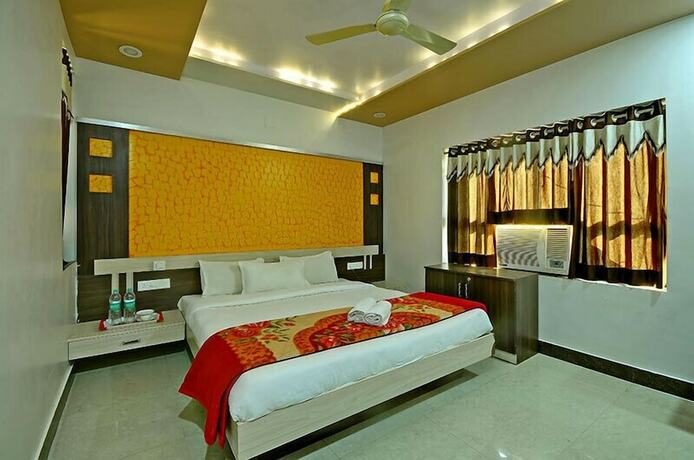 Imagen de la habitación del Hotel Gopal, Dwarka. Foto 18