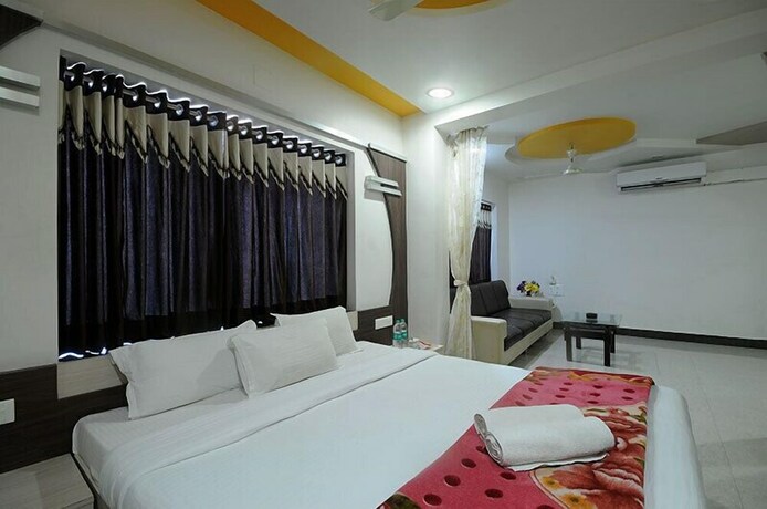 Imagen de la habitación del Hotel Gopal, Dwarka. Foto 21