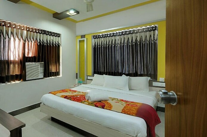 Imagen de la habitación del Hotel Gopal, Dwarka. Foto 27