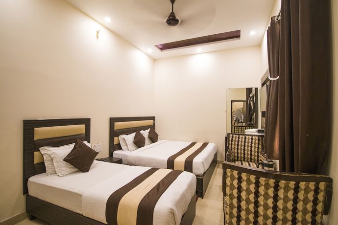 Imagen de la habitación del Hotel Gopal, Haridwar. Foto 13