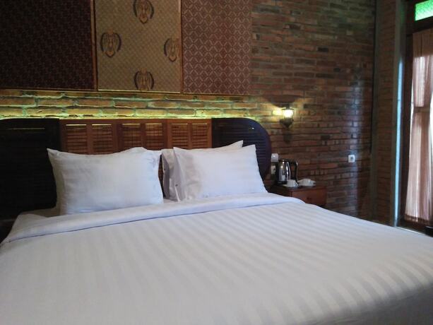 Imagen de la habitación del Hotel Gopalan Borobudur. Foto 30