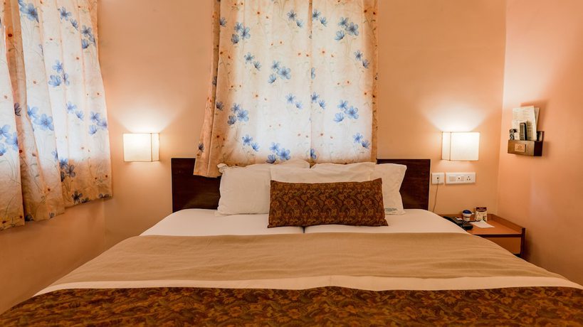 Imagen de la habitación del Hotel Gopika International. Foto 9