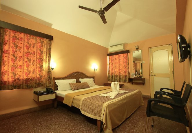 Imagen de la habitación del Hotel Gopika International. Foto 12