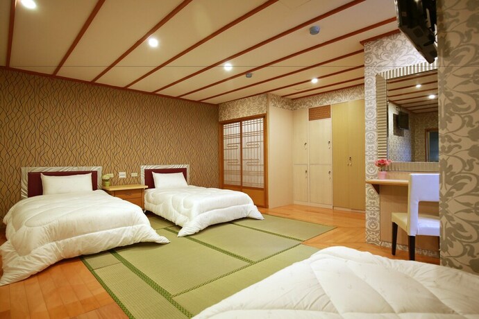 Imagen de la habitación del Hotel Gorgeous Hot Spring Resort. Foto 37