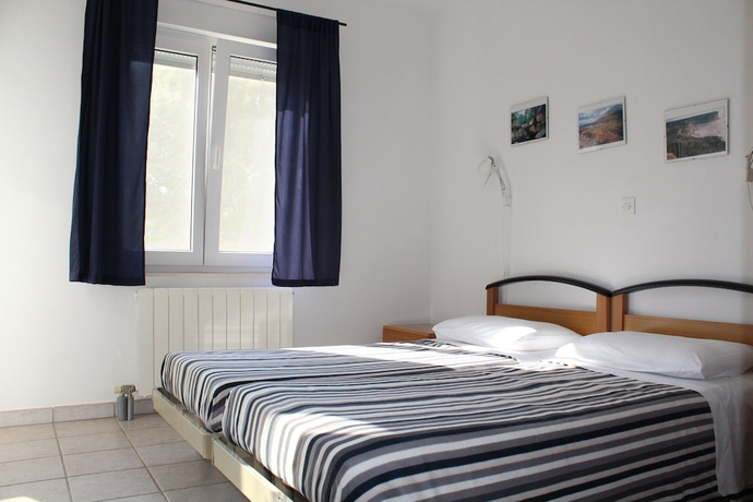 Imagen de la habitación del Hotel Gorgonia Apartments. Foto 7