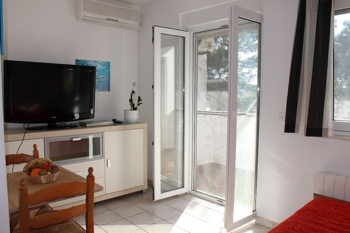 Imagen de la habitación del Hotel Gorgonia Apartments. Foto 13