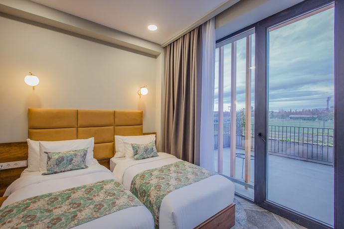 Imagen de la habitación del Hotel Gori Inn. Foto 7