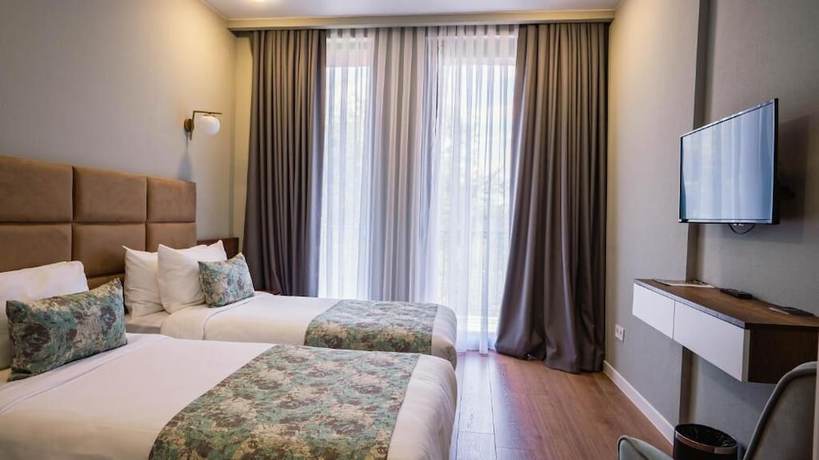 Imagen de la habitación del Hotel Gori Inn. Foto 14