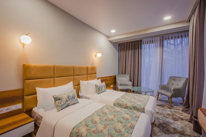 Imagen de la habitación del Hotel Gori Inn. Foto 18