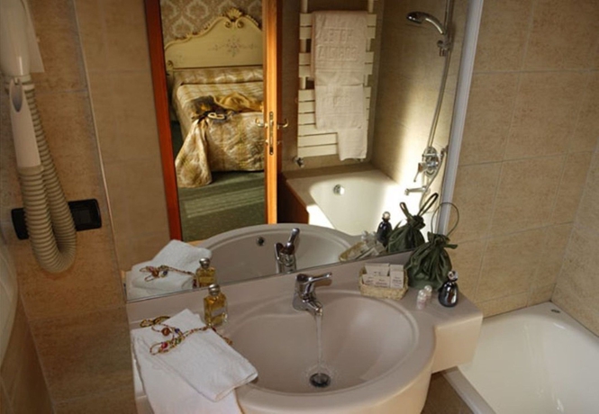 Imagen de la habitación del Hotel Gorizia A La Valigia. Foto 12