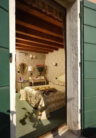 Imagen de la habitación del Hotel Gorizia A La Valigia. Foto 14