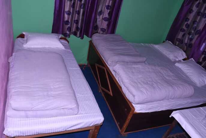 Imagen de la habitación del Hotel Goroomgo Anjali Home Stay Uttarakhand. Foto 15