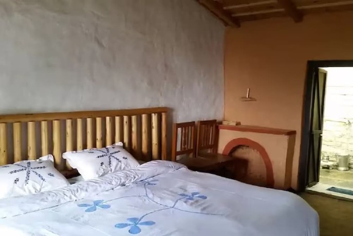 Imagen de la habitación del Hotel Goroomgo Anjali Home Stay Uttarakhand. Foto 18