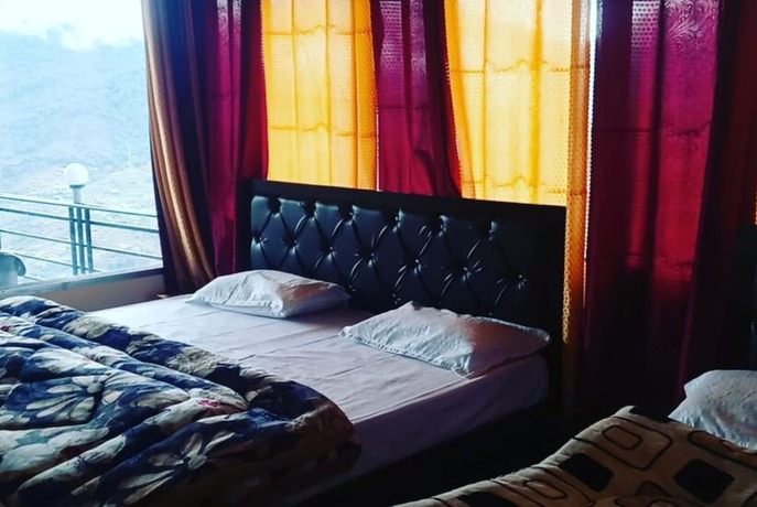 Imagen de la habitación del Hotel Goroomgo Anjali Home Stay Uttarakhand. Foto 19
