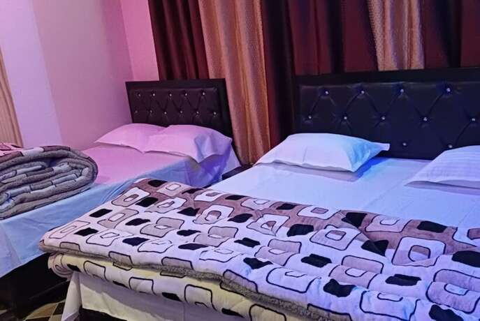 Imagen de la habitación del Hotel Goroomgo Anjali Home Stay Uttarakhand. Foto 20