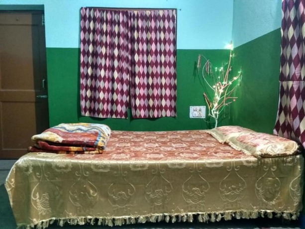 Imagen de la habitación del Hotel Goroomgo Ansari House Bodhgaya. Foto 3