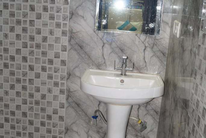 Imagen de la habitación del Hotel Goroomgo Apana Keshari Lodge Bhilai. Foto 3