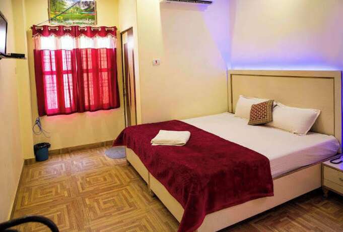 Imagen de la habitación del Hotel Goroomgo Assi River Guest House Varanasi. Foto 5