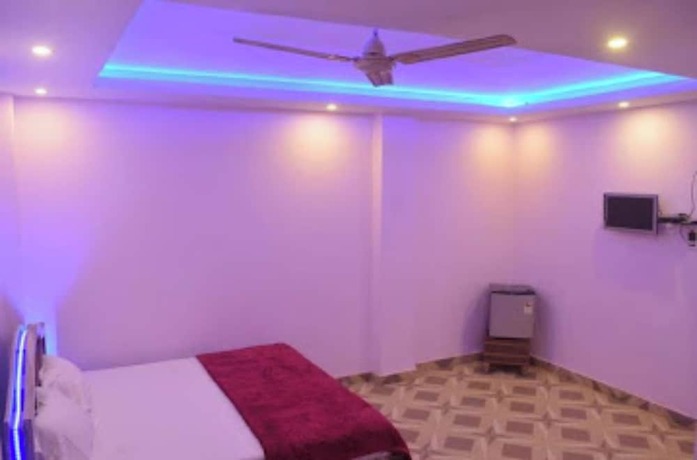 Imagen de la habitación del Hotel Goroomgo Assi River Guest House Varanasi. Foto 7