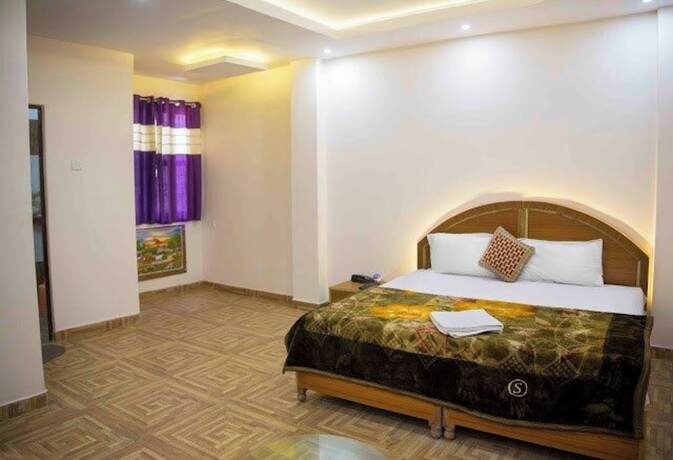 Imagen de la habitación del Hotel Goroomgo Assi River Guest House Varanasi. Foto 8