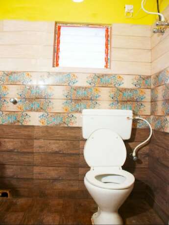 Imagen de la habitación del Hotel Goroomgo Avipsha Digha. Foto 7