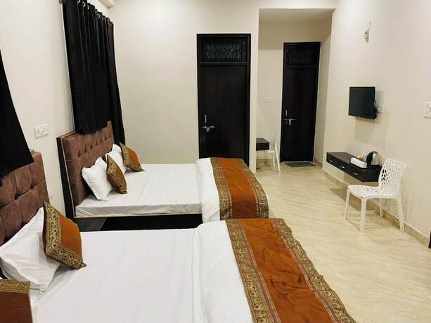 Imagen de la habitación del Hotel Goroomgo Banaras Homestay Varanasi. Foto 8