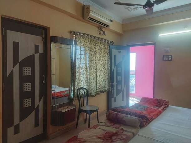 Imagen de la habitación del Hotel Goroomgo Barsha Resort Digha. Foto 18