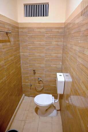 Imagen de la habitación del Hotel Goroomgo Bhagwaan Das Varanasi. Foto 12