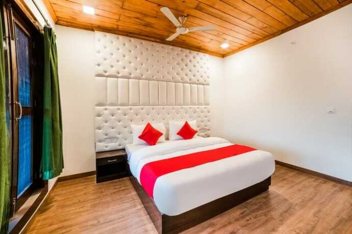 Imagen de la habitación del Hotel Goroomgo Blue Moon Bhimtal. Foto 12