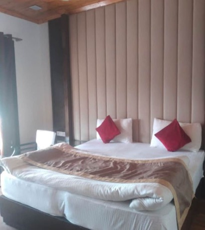 Imagen de la habitación del Hotel Goroomgo Blue Moon Bhimtal. Foto 13
