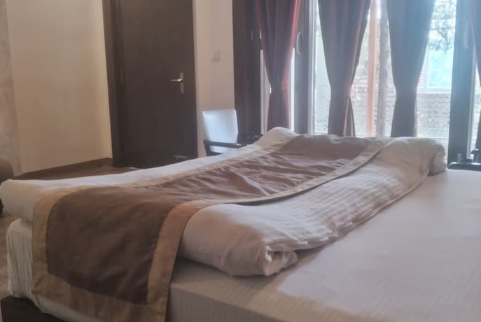 Imagen general del Hotel Goroomgo Blue Moon Bhimtal. Foto 7