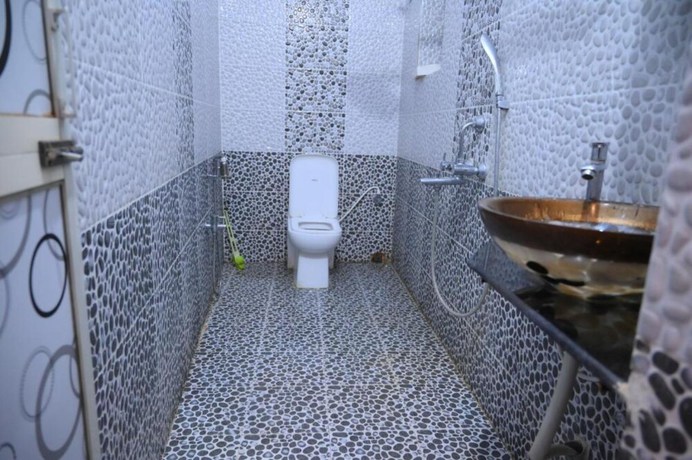 Imagen de la habitación del Hotel Goroomgo Bottoms Up Villa Bhubaneswar. Foto 6