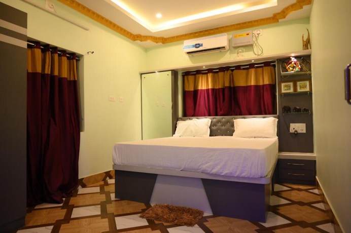 Imagen de la habitación del Hotel Goroomgo Bottoms Up Villa Bhubaneswar. Foto 7