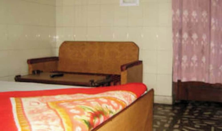 Imagen de la habitación del Hotel Goroomgo Brij Dham Guest House Mathura. Foto 8
