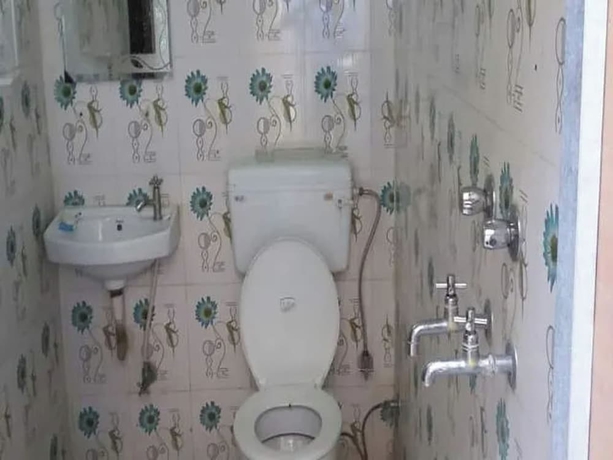 Imagen de la habitación del Hotel Goroomgo Brij Dham Guest House Mathura. Foto 12
