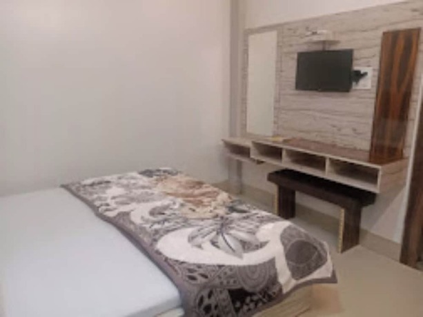 Imagen de la habitación del Hotel Goroomgo Brij Raj Guest House Mathura. Foto 11