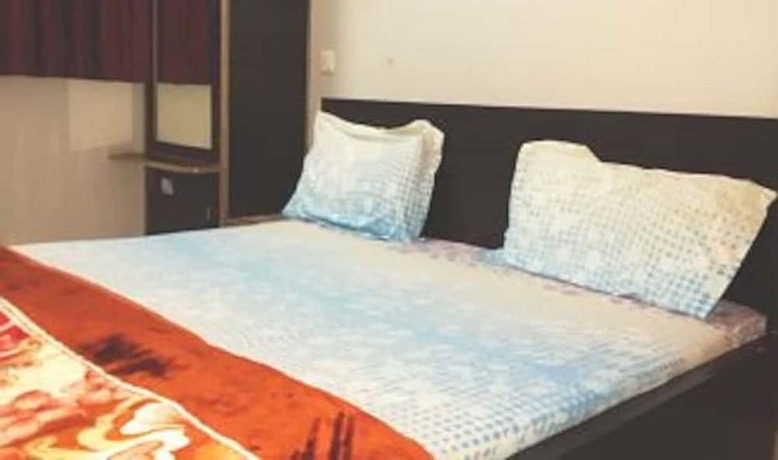 Imagen de la habitación del Hotel Goroomgo Brij Raj Guest House Mathura. Foto 12