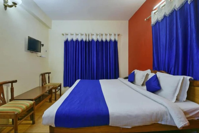 Imagen de la habitación del Hotel Goroomgo Chinar Lake View Nainital. Foto 6